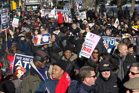 Striking New Yotk workers on the march yesterday